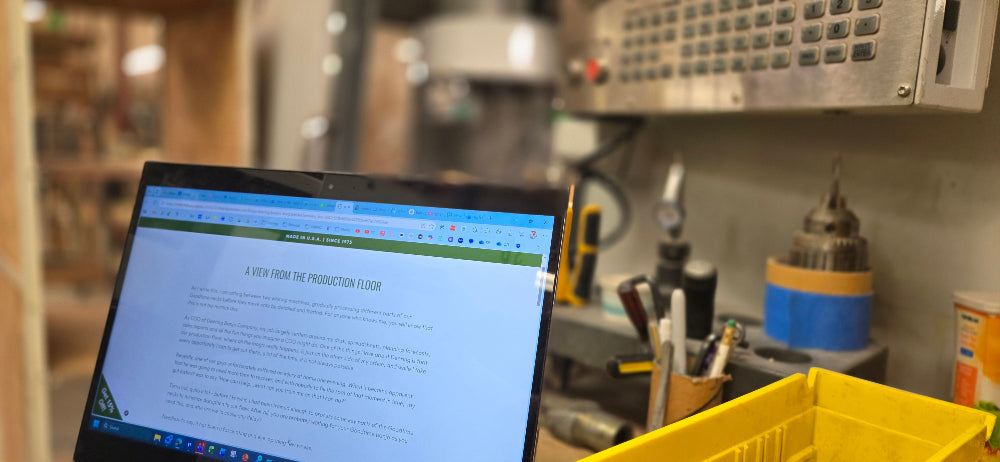 laptop next to machine