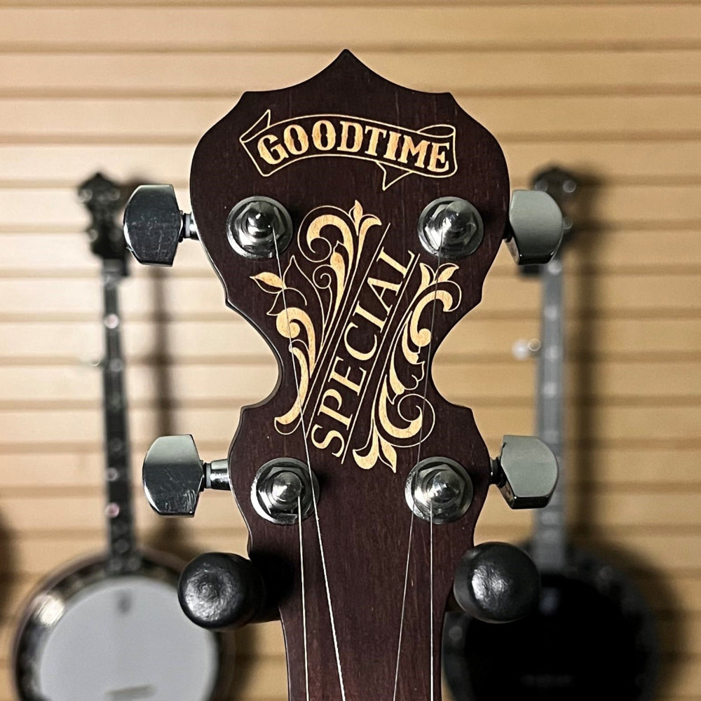 Close-up of a banjo headstock with 'Goodtime Special' branding against a blurred background. Guitar Style Tuner