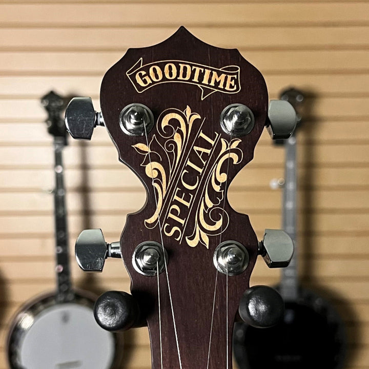 Close-up of a banjo headstock with 'Goodtime Special' branding against a blurred background. Guitar Style Tuner