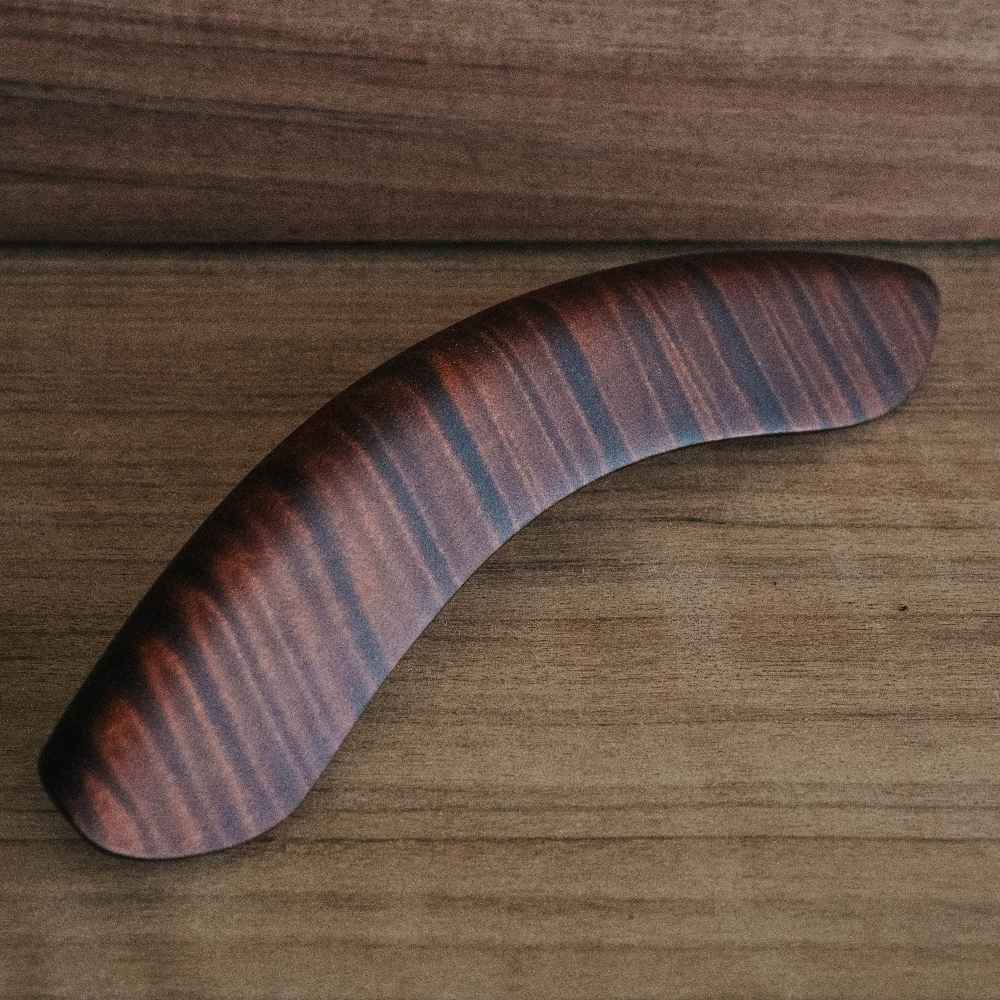 DeeringWoodenArmrest-CurlyMaple-EagleIIStain-LifestyleBackground, front