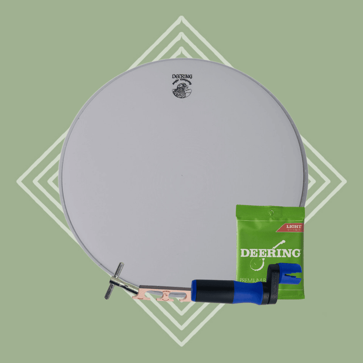 Deering Banjo Head Change Package, one set of light strings, one peg winder, one Deering Smile bridge, one tr wrench, green background