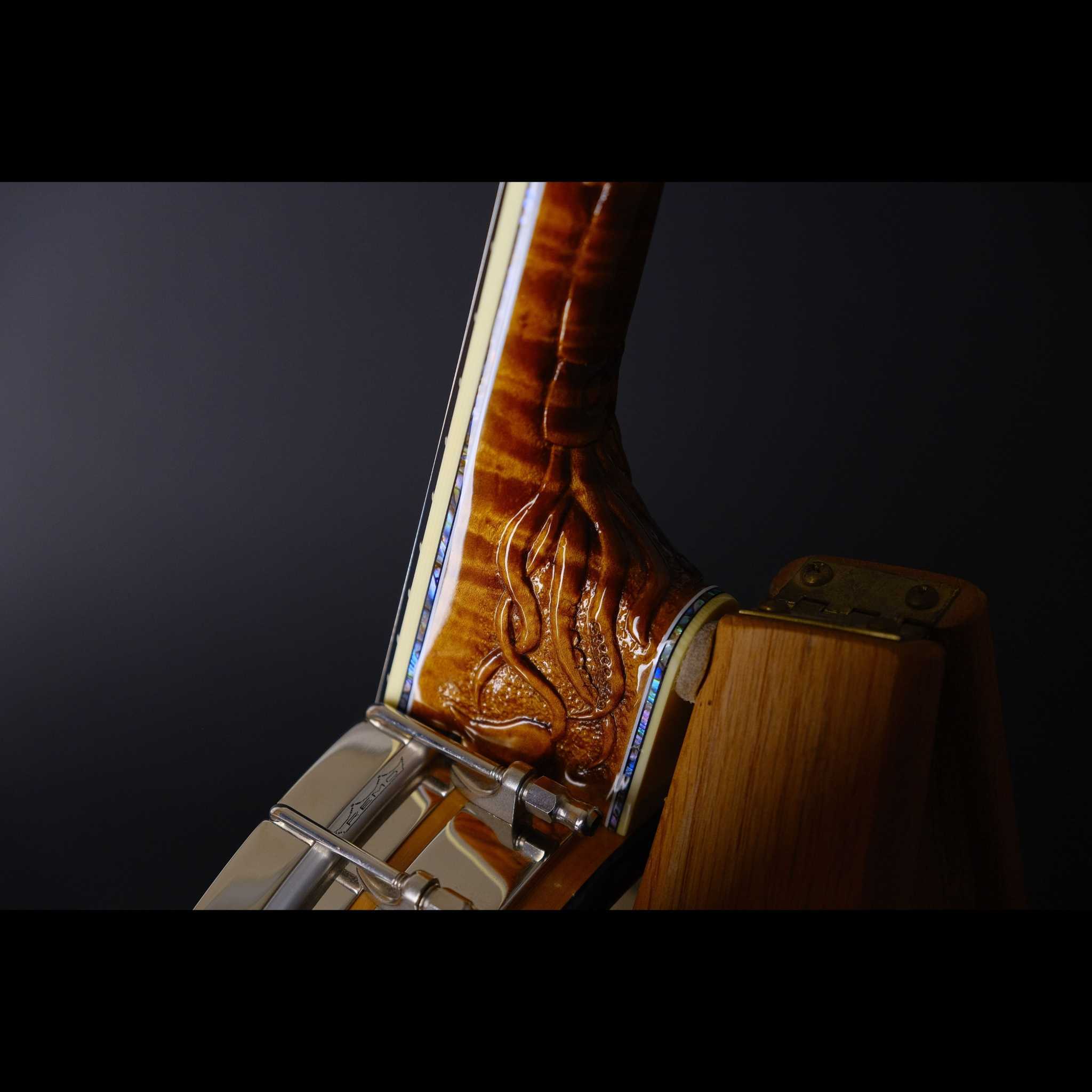 Nemo 20,000 leagues under the sea themed banjo side angle of the squid heel carving