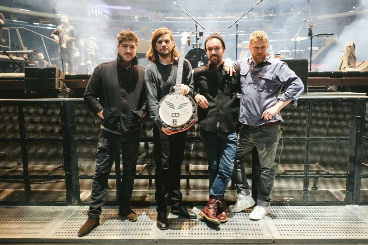 Mumford & Sons with the Canada Charity Goodtime Banjo