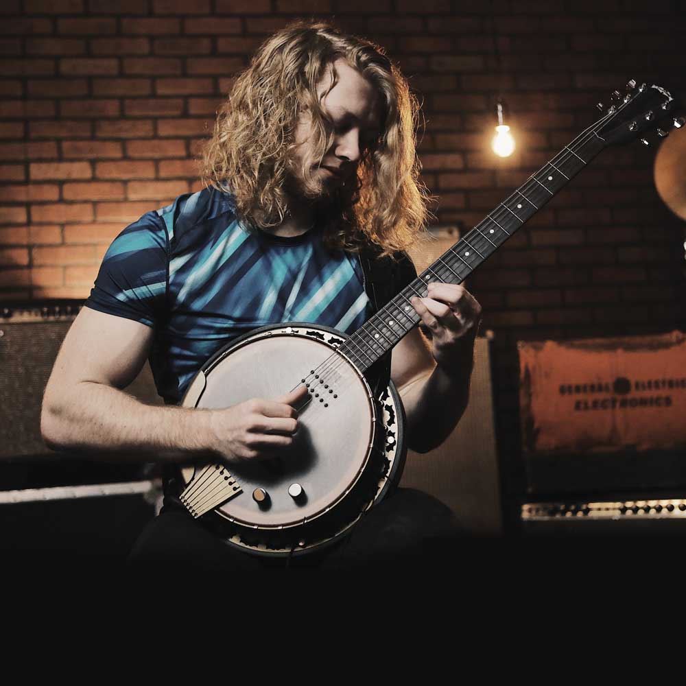Jacob Moore with the Deering Phoenix 6-string banjo
