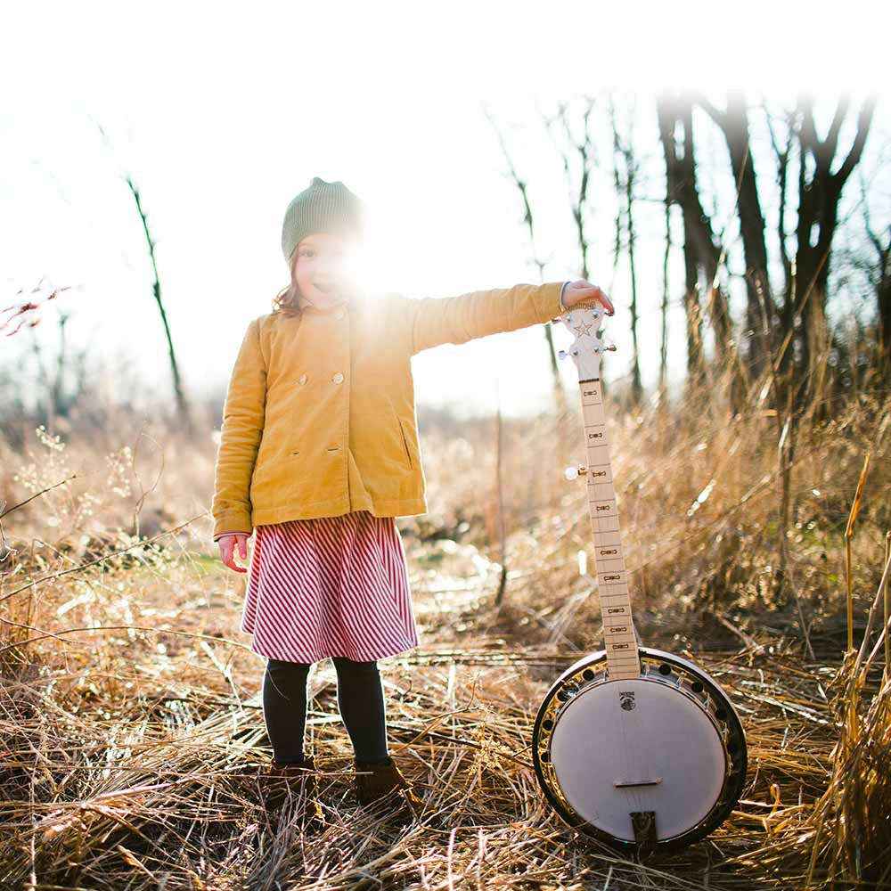 Deering Goodtime Two banjo with girl